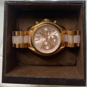 Michael Kors rose gold watch (women’s)
